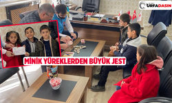 Ceylanpınarlı üçüzler kumbaralarında biriktirdikleri bağışladı
