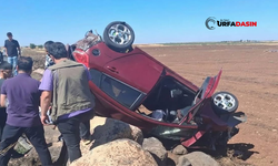 Şanlıurfa'da Kontrolden Çıkan Otomobil Taşlık Alana Devrildi